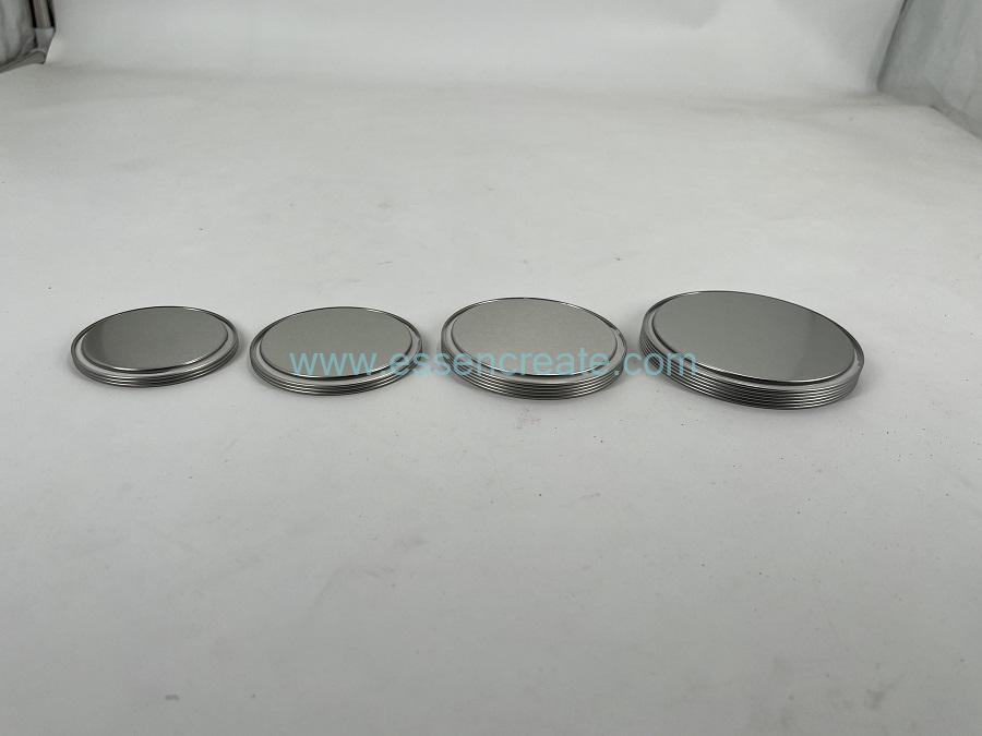 Frasco empacador de pastillas de vidrio con tapón de rosca de aluminio.