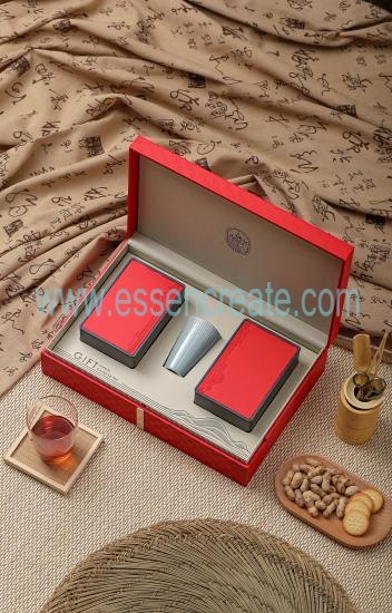 There Are Two Iron Boxes And a Cup In The Gift Box