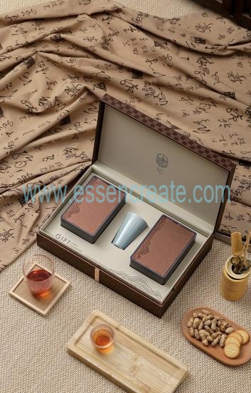 There Are Two Iron Boxes And a Cup In The Gift Box